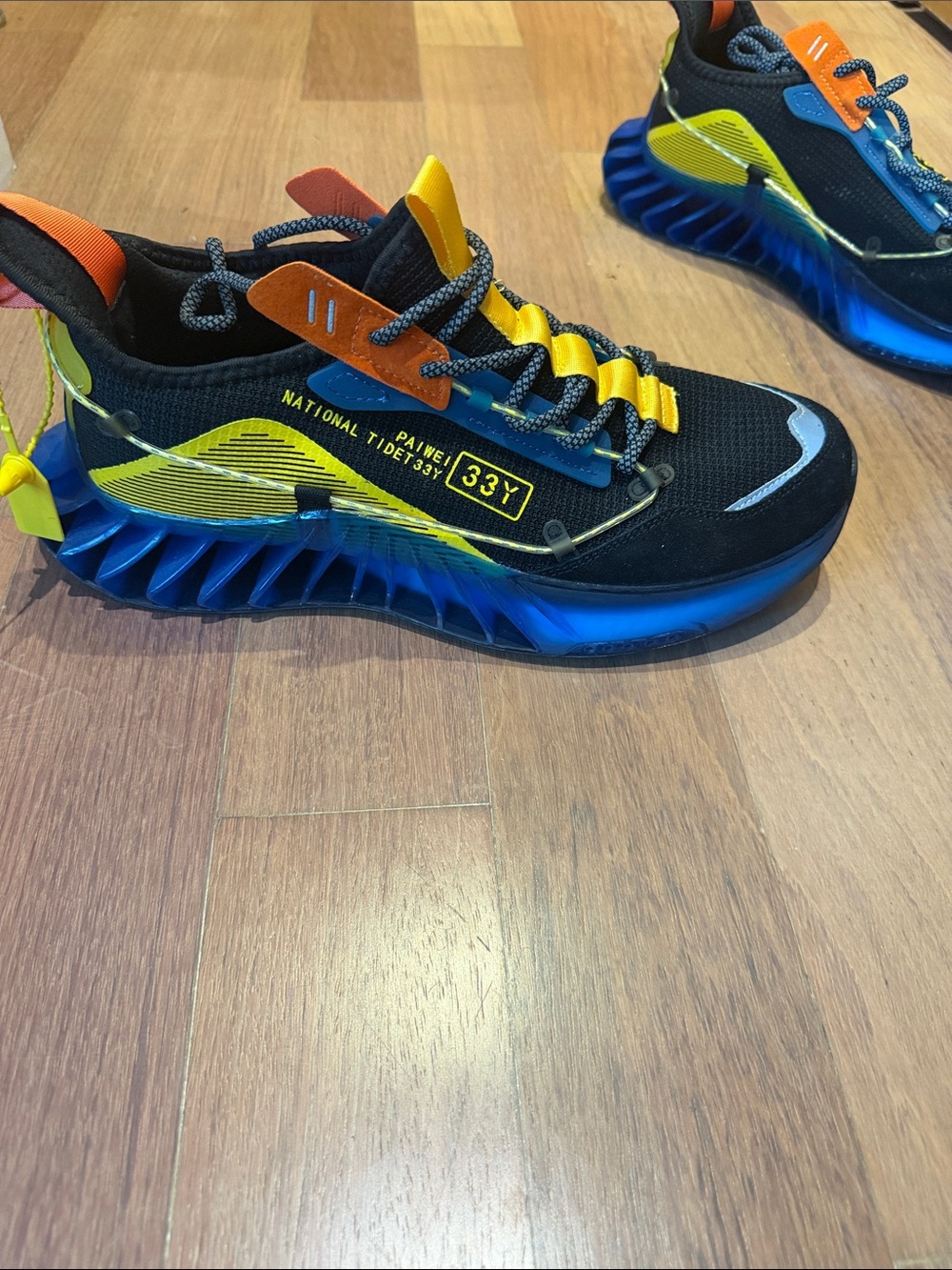 Men's Black Sneakers with Blue Sole and Yellow Accents